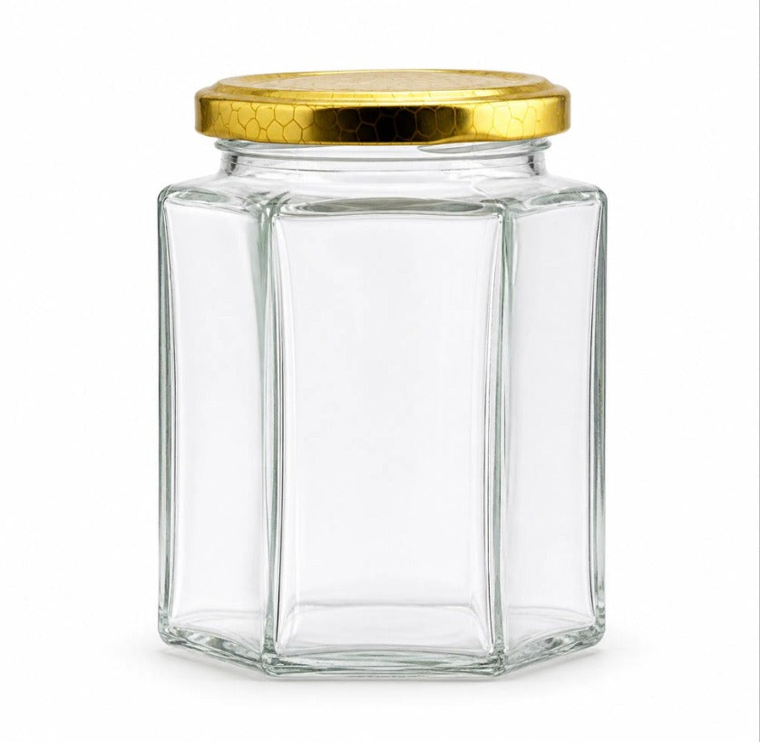 Hexagonal glass jar with gold lid